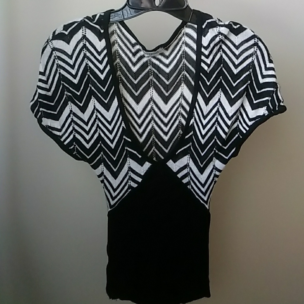 Black and White deep v-neck light sweater.